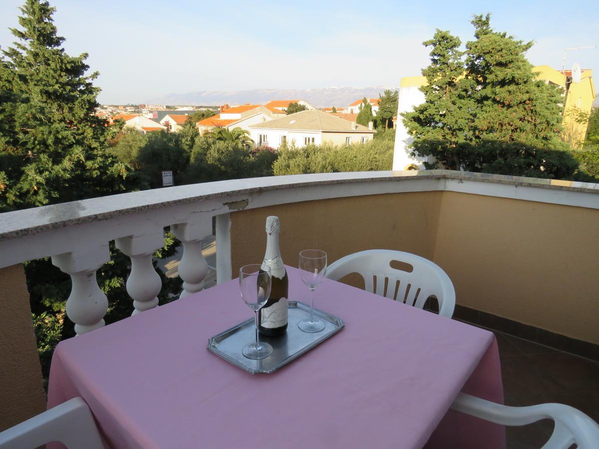 Apartments Palma Novalja Pokoj fotografie