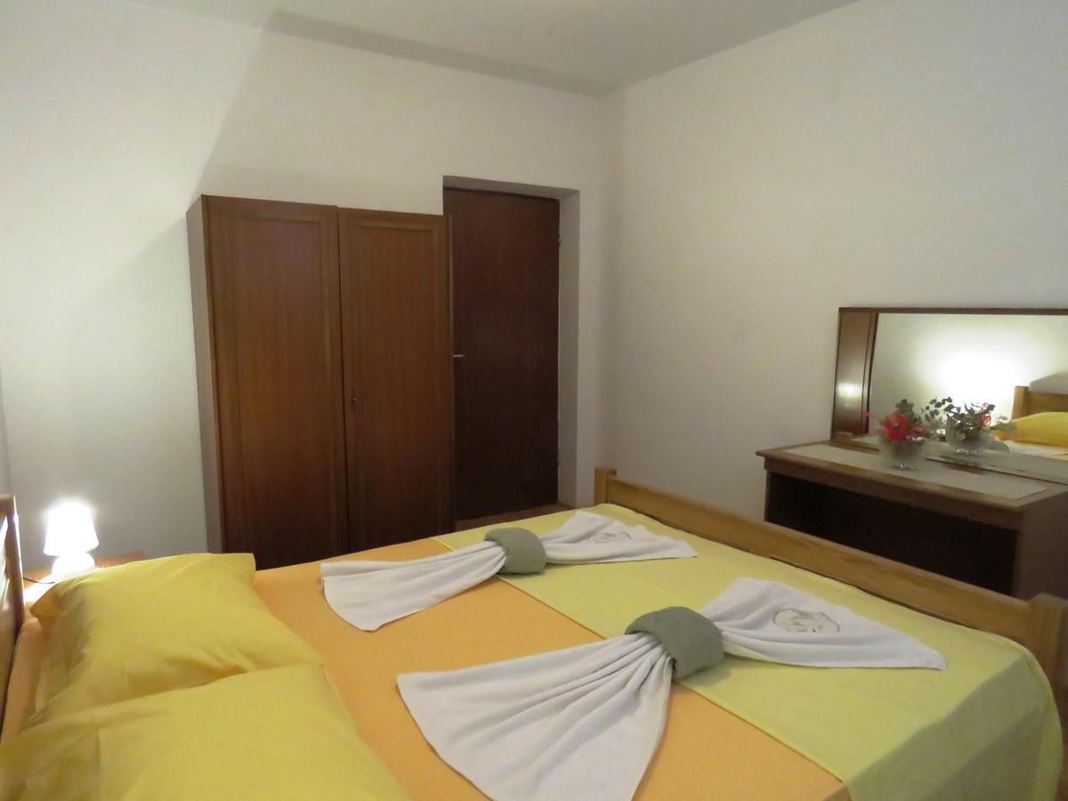 Apartments Palma Novalja Pokoj fotografie